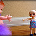 It was the Knickerbocker Rattle Doll in the Living Room with the Purple Boa! by Didi Wood
